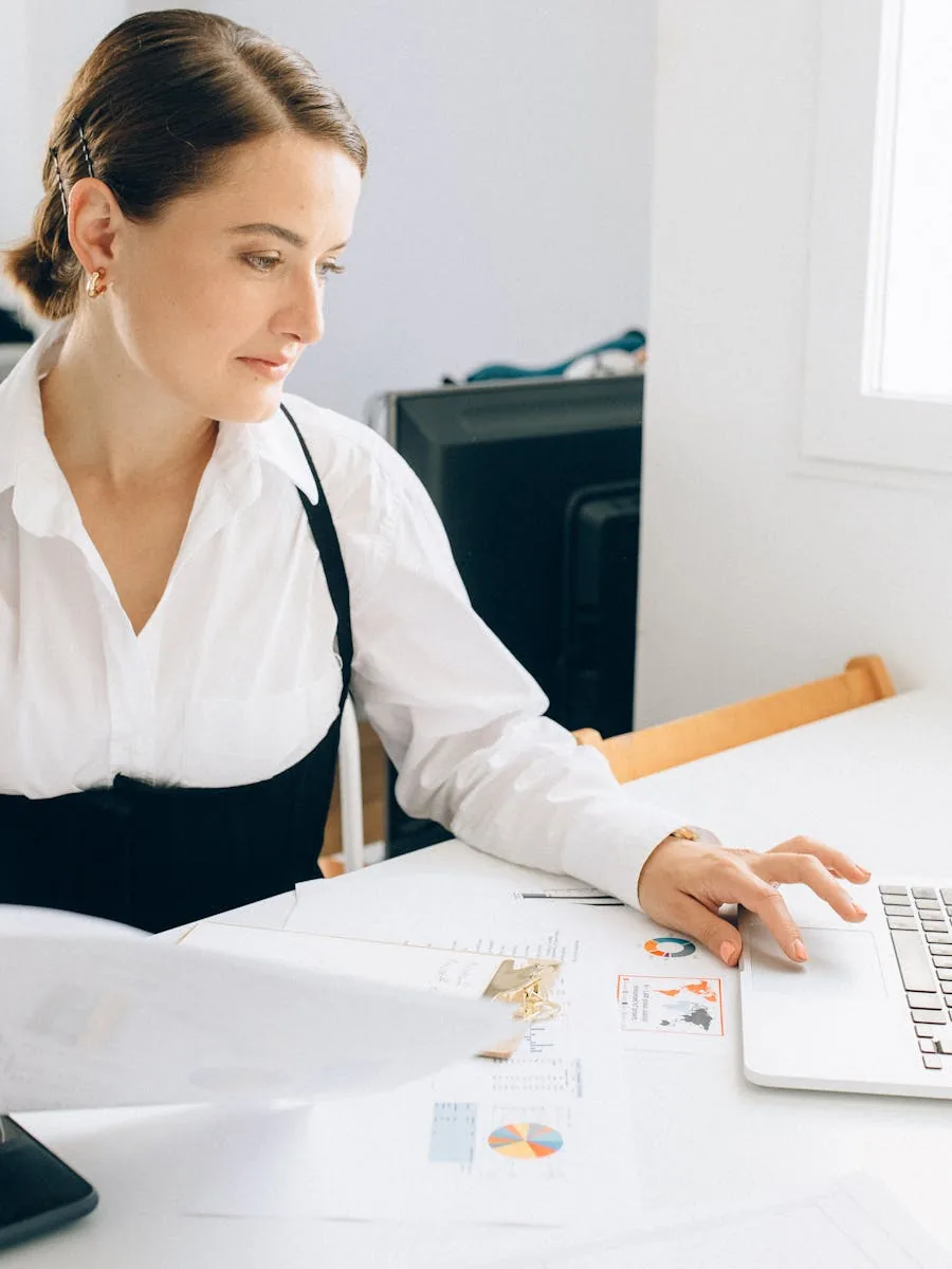 Creator reviewing Instagram performance charts and analytics to understand how the Reels algorithm ranks content