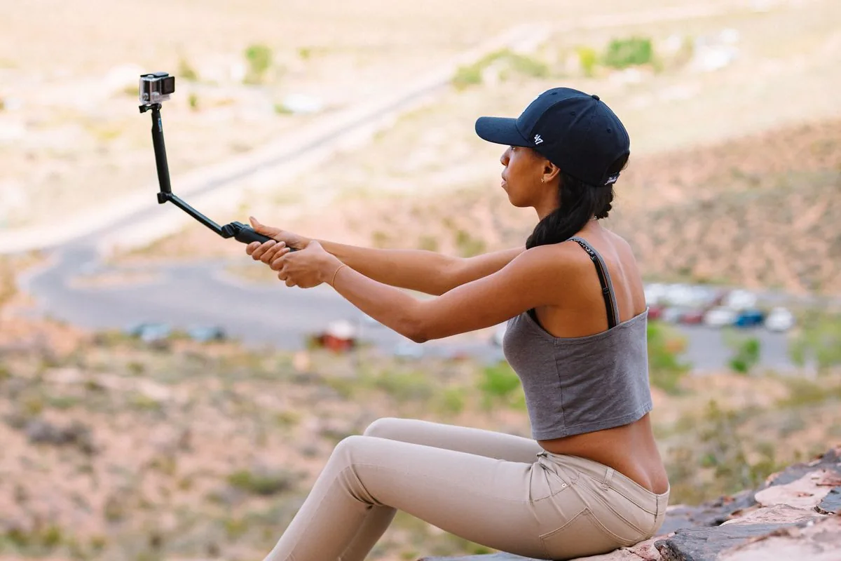 Content creator filming a video, the kind of real content that earns genuine YouTube likes from real viewers