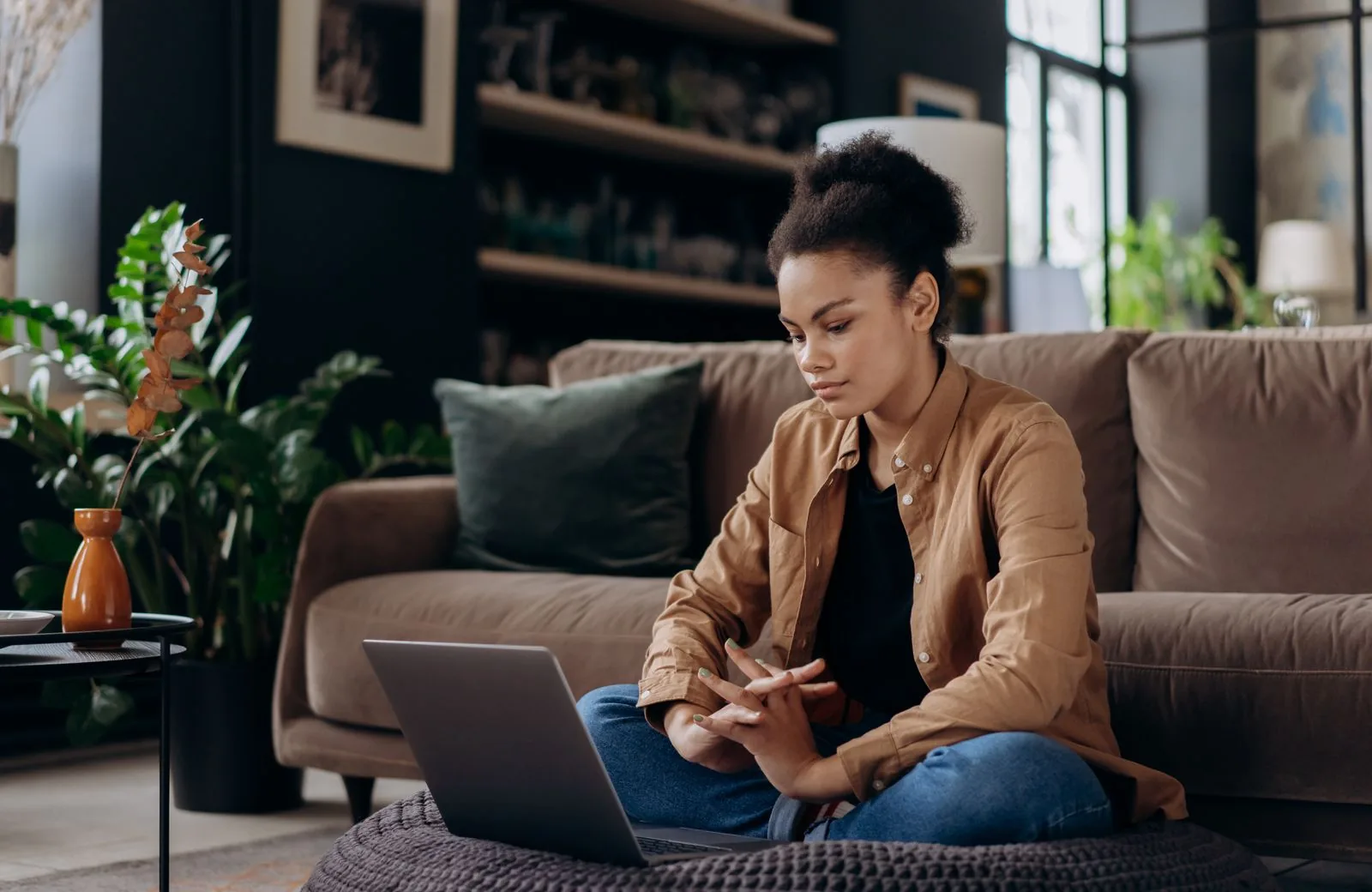 Creator buying YouTube views safely from a laptop using only a public video URL, with no password required